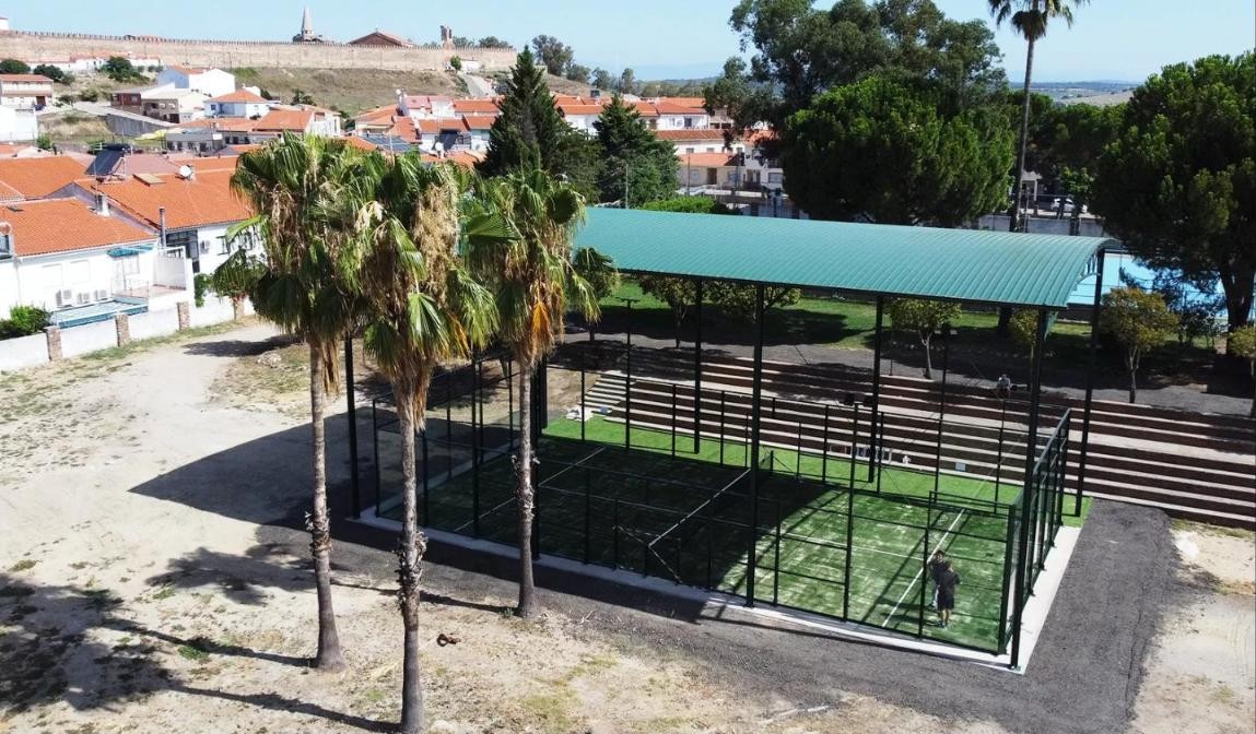 Outdoor padel court with a canopy roof built by SportBS for year-round play